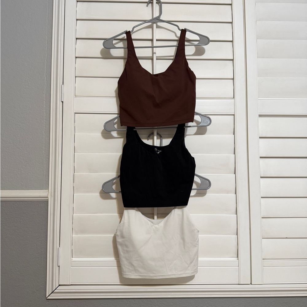 Aerie offline padded workout Tops in Brown, Black, and White